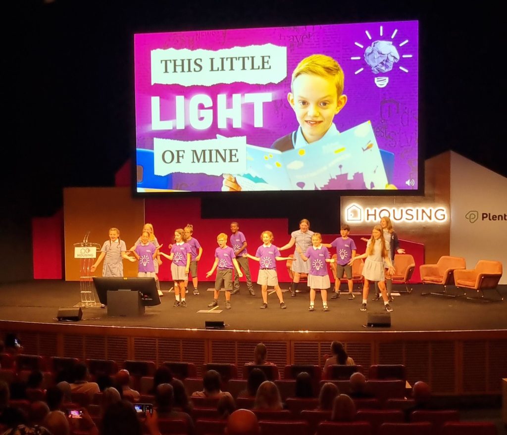 School children from Monksdown Primary on stage at the CIH conference