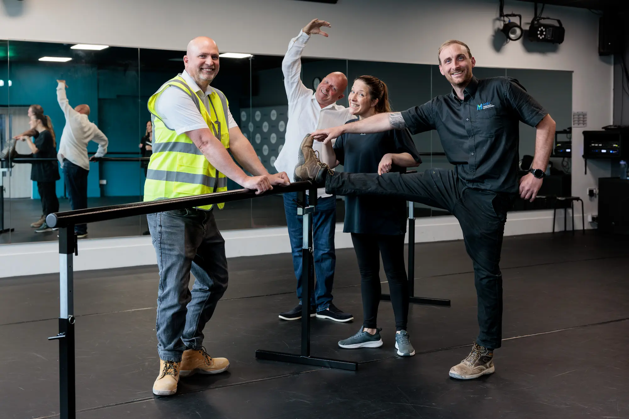 builders learning ballet - New Ferry Development